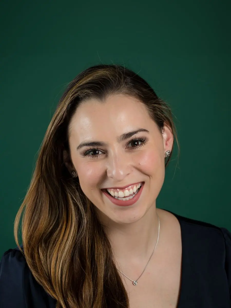 studio portrait on a green backdrop