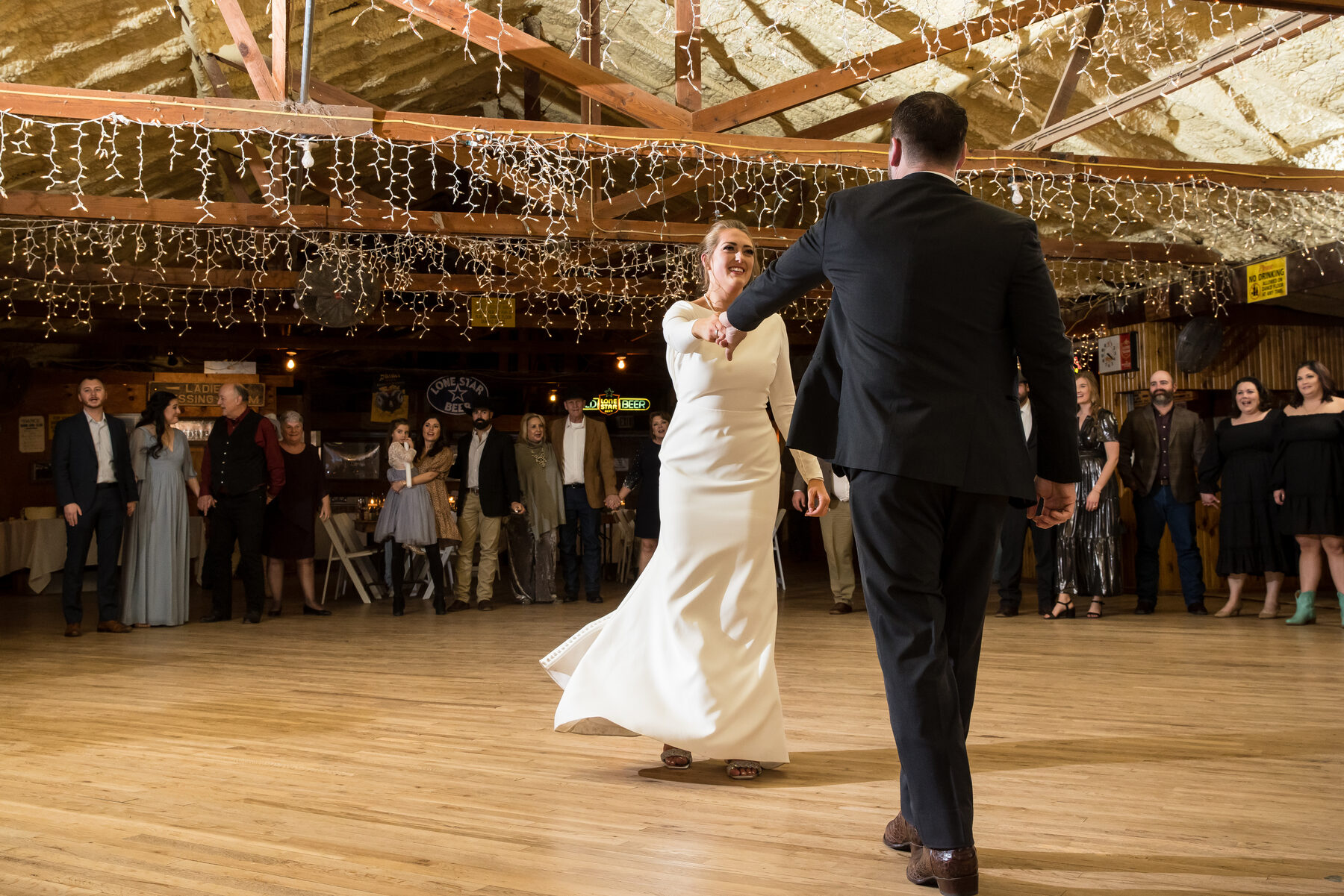 First dance in a string-lit barn