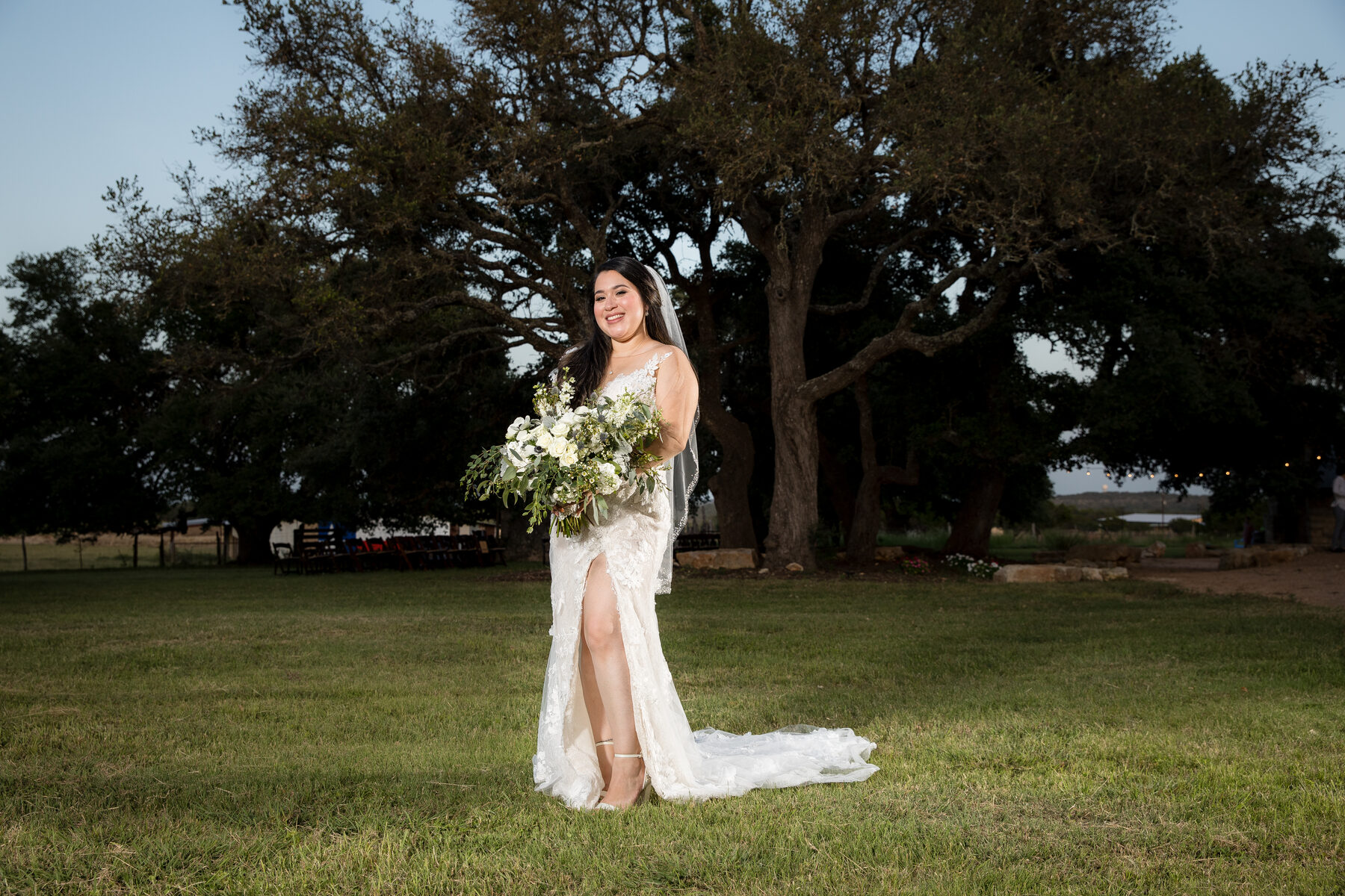 Bride solo portrait under oak tree