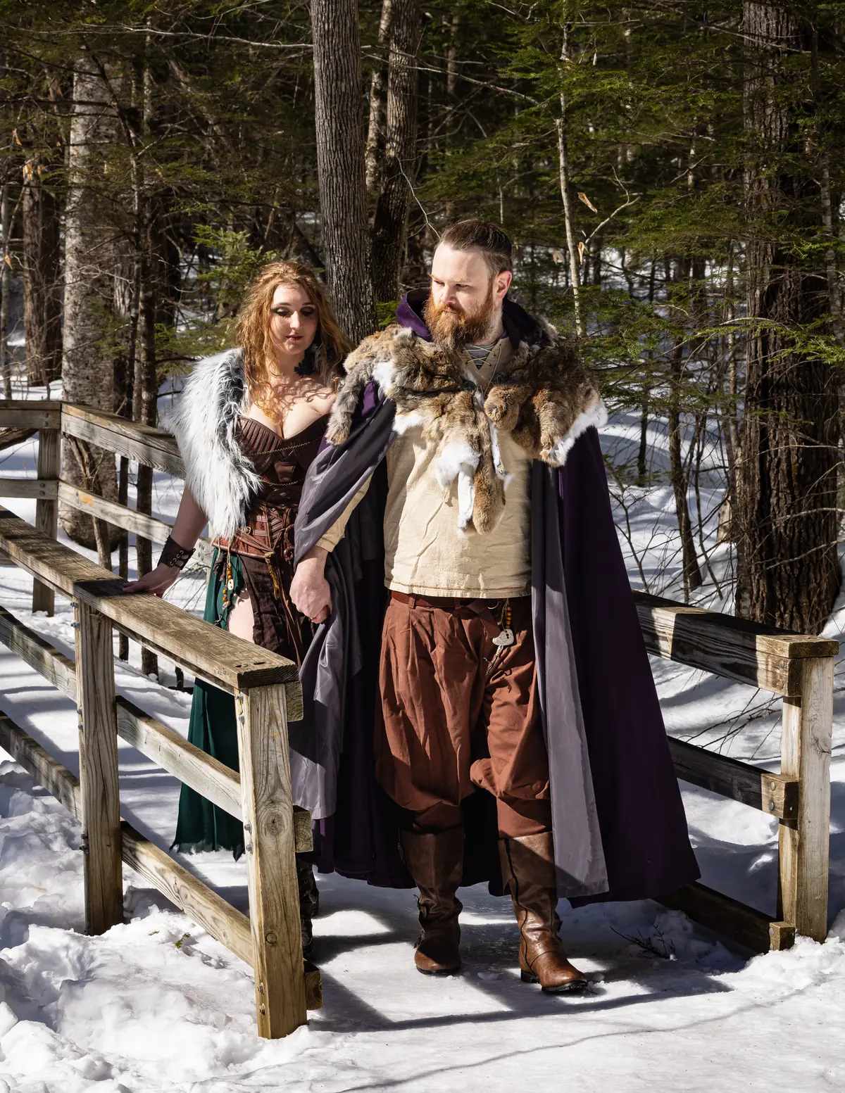 Couple in Viking cloaks on the boardwalk at Diana's Baths, Bartlett, New Hampshire